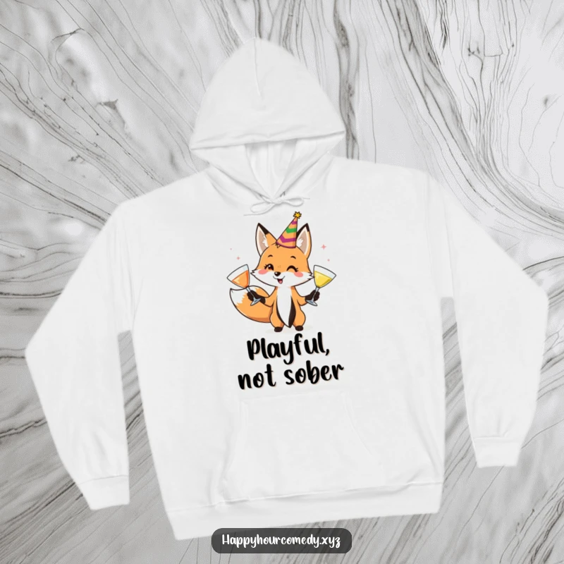Funny Fox Juggler Hoodie shows a playful fox in a party hat, juggling cocktail glasses, offering warmth and a touch of festive fun.